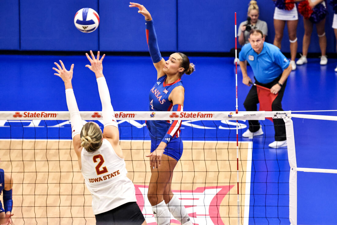 Kansas volleyball uses fiery offensive performance to rally in four-set victory over Iowa State